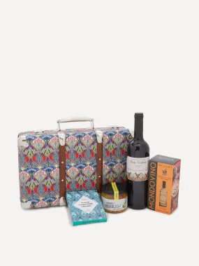 Multi-coloured printed suitcase hamper